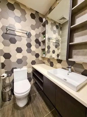 a bathroom with a toilet and a sink at Romantic Log Cabin - walk to KL Tower, KLCC, Bukit Bintang in Kuala Lumpur