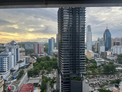 a view of a city with a tall building at ComfyHomes M101 Dang Wangi Pool KLCC View in Kuala Lumpur