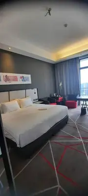 a bedroom with a large bed in a room at ComfyHomes M101 Dang Wangi Pool KLCC View in Kuala Lumpur