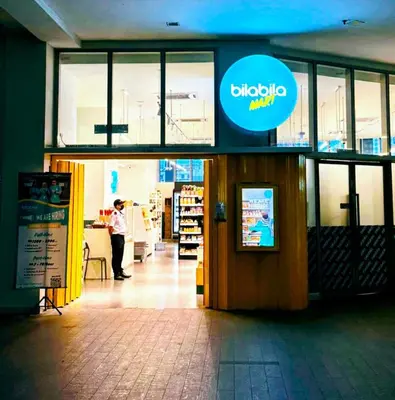 a person standing inside of a store at Regalia Modern Studio in Kuala Lumpur