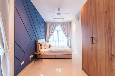 a small bedroom with a bed and a window at Legasi @ Kampung Bharu in Kuala Lumpur