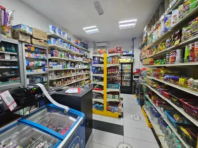 a store aisle of a grocery store filled with goods at The Wisdom Apartment in Kuala Lumpur