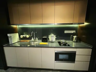 a kitchen with a sink and a counter top at Luxury Scarletz Suite KLCC in Kuala Lumpur
