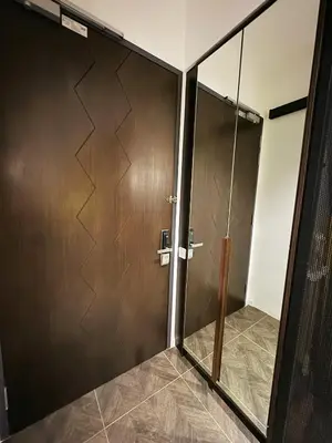 a shower stall with a glass door in a bathroom at Luxury Scarletz Suite KLCC in Kuala Lumpur