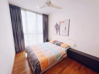 a bedroom with a bed with a ceiling fan and a window at [PROMO]Connected train 2 Bedroom (ABOVE MALL)15 in Kuala Lumpur