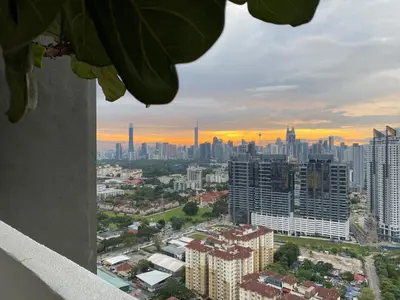 a view of a city skyline from a building at Skyline Garden 2 Bedrooms Homestay Near KLCC in Kuala Lumpur