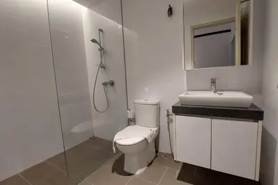 a bathroom with a shower and a toilet and a sink at KL Sentral, EST Bangsar #9, 4Pax in Kuala Lumpur