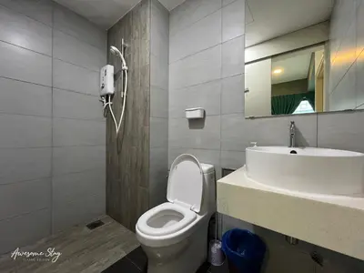 a bathroom with a toilet and a sink at Arte plus by Sweet home in Kuala Lumpur