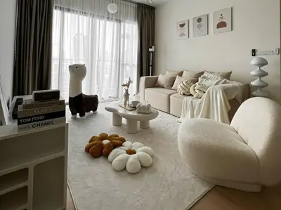 a living room with a white couch and a table at INS Style 5PAX 2R2B Sunway Velocity Linked in Kuala Lumpur
