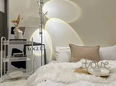 a white bed with a white blanket and a table at INS Style 5PAX 2R2B Sunway Velocity Linked in Kuala Lumpur
