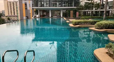 a large blue swimming pool in a building at INS Style 5PAX 2R2B Sunway Velocity Linked in Kuala Lumpur