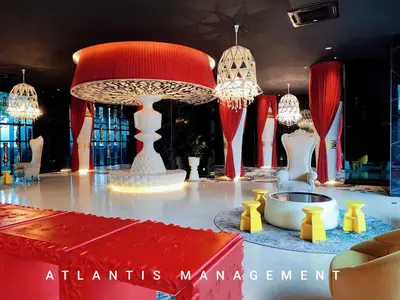 a room with a table with chandeliers on it at Arte Mont Kiara, Private Elegant Suite manage by Atlantis Management in Kuala Lumpur