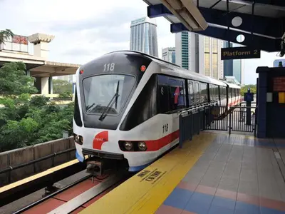 a train is stopped at a train station at Superior Maya Kuala Lumpur in Kuala Lumpur