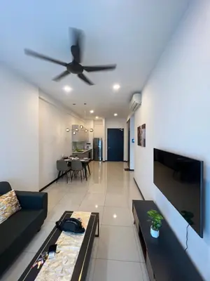 a living room with a couch and a ceiling fan at Opus Residences KL Malaysia in Kuala Lumpur