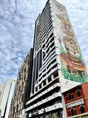a tall building with a mural on the side of it at #23 KL towel view twin bed suites @ infinity pool in Kuala Lumpur