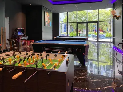 a large pool table in a room with a pool table at Star Sky Park KLCC in Kuala Lumpur
