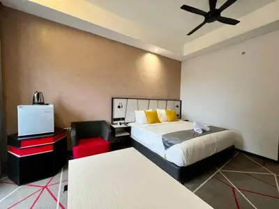 a bedroom with a bed and a ceiling fan at #211 M101 Dang Wangi KLCC View Pool By Livin in Kuala Lumpur