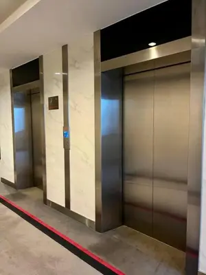 a row of elevator doors in a building at #211 M101 Dang Wangi KLCC View Pool By Livin in Kuala Lumpur