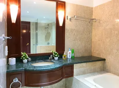 a bathroom with a sink and a mirror at Homestay Heart of Bukit Bintang Walk to Monorail & LRT St by Cloud Host in Kuala Lumpur