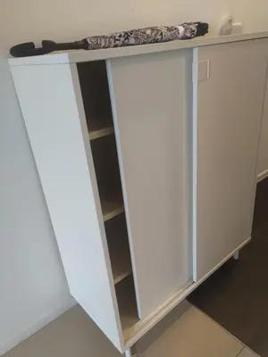 a white cabinet with a shelf at Arcoris Soho 1-4PAX COZY HOME in Kuala Lumpur