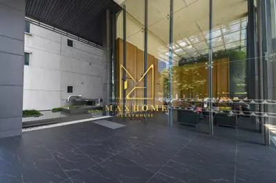 a view of a building with a welcome sign on it at Maxhome Premium at Dorsett Bukit Bintang in Kuala Lumpur