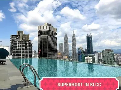 a swimming pool on the roof of a building at Maxhome Premium at Dorsett Bukit Bintang in Kuala Lumpur