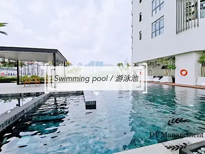 a swimming pool in front of a building at Mid Valley - Vivo Residence Center Of KL 6-8Pax in Kuala Lumpur