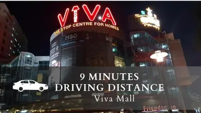 a sign for a viva building with a car on it at Smile Hotel Cheras Sri Permaisuri in Kuala Lumpur