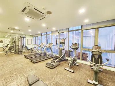 a gym with treadmills and ellipticals in a building at 1-6px Bukit Bintang 1min walk to Lot10 Pavilion in Kuala Lumpur