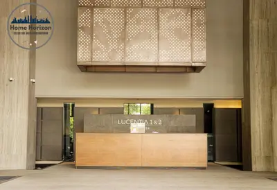 a lobby with a reception desk in a building at Premium Suites by Home Horizon at Lucentia Residence in Kuala Lumpur