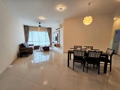 a dining room and living room with a table and chairs at Crest Residence Klcc by Sarah's Lodge in Kuala Lumpur