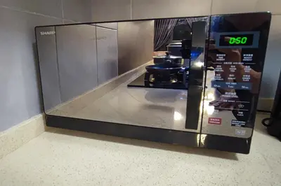 a microwave oven with a coffee maker in it at Massive KL View at M-Vertica by HCK in Kuala Lumpur