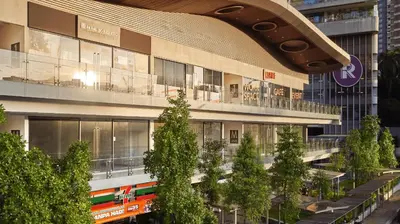 a large building with trees in front of it at S31- 3 Bedroom Robertson at Bukit Bintang with Netflix in Kuala Lumpur