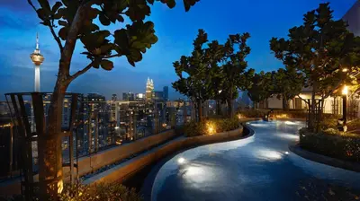 a view of a city skyline at night at S31- 3 Bedroom Robertson at Bukit Bintang with Netflix in Kuala Lumpur