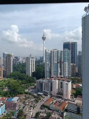 a view of a city with the space needle in the distance at S36- Robertson at Bukit Bintang 3 Bedroom with Netflix in Kuala Lumpur