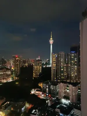 a view of a city at night with a tower at S37- Bukit Bintang 3 Bedroom Suite with Netflix Robertson in Kuala Lumpur