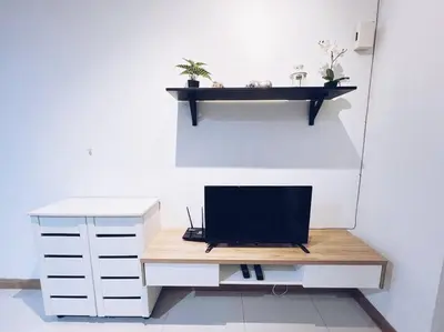 a desk with a laptop computer on top of it at PROMO CONNECTED TRAIN 1 Bedroom ABOVE MALL - 5 in Kuala Lumpur