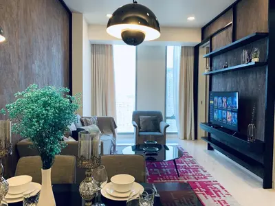a living room with a couch and a tv at Tropicana The Residences KLCC, Premium in Kuala Lumpur