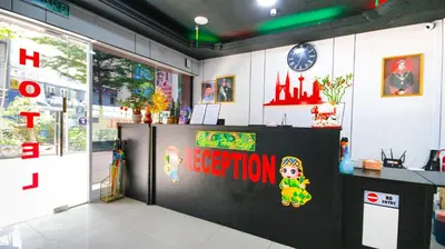 a store with a sign that reads operation at Red Velvet Inn Bukit Bintang in Kuala Lumpur