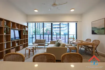a living room with a couch and a table at ASTORIA AMPANG in Kuala Lumpur