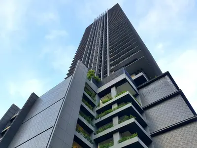 a tall building with balconies on the side of it at Anggun Residences KLCC by Urbanscape in Kuala Lumpur