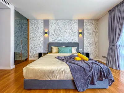 a bedroom with a king sized bed in a room at Anggun Residence Serviced Suites By BedStay in Kuala Lumpur