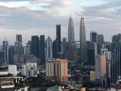a view of a large city with tall buildings at TR Residence 3R2B Serviced Apt 5-6pax HKL,IJN,PWTC KL in Kuala Lumpur