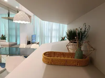 a wicker basket sitting on a counter in a living room at The Robertson @ 118 Tower Super View in Kuala Lumpur