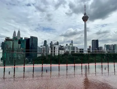 a view of the seattle skyline with the space needle at #173 M101 Dang Wangi KLCC View Pool By Livin in Kuala Lumpur