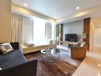 a living room with two couches and a television at Tropicana The Residences - KLCC VIEW Luxury Apartment Collections in Kuala Lumpur