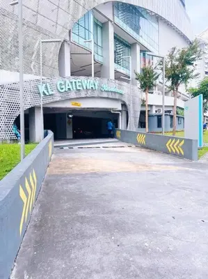 a building with a tunnel in front of it at PROMO Connected Train 2 Bedroom ABOVE MALL 289 in Kuala Lumpur