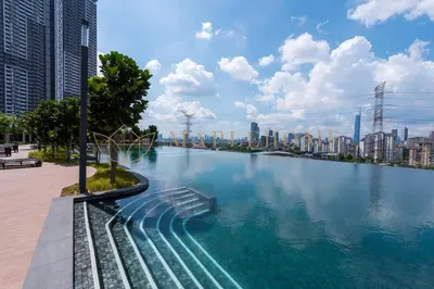 a large body of water with a city in the background at M Vertica Premier Suites Kuala Lumpur in Kuala Lumpur