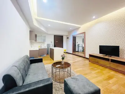 a living room with a couch and a tv at Awesomestay Apartment walk to PWTC near to KLCC in Kuala Lumpur