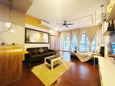 a living room with a couch and a table at Awesomestay Apartment walk to PWTC near to KLCC in Kuala Lumpur